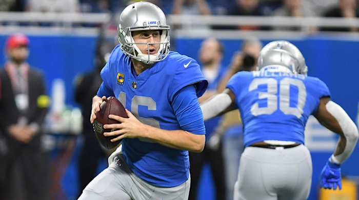 Jared Goff rolls out and prepares to throw